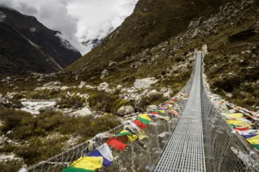 mountain valley prayer flag lined swing